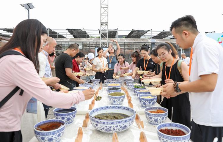 石磨豆花之乡千人点豆花大型品鉴活动启动 将持续至10月3日