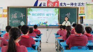 郑州高新区长椿路小学：粽叶飘香过端午 缤纷童趣庆佳节