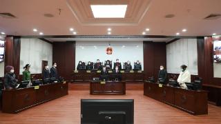 河南女子举报父亲被打死案宣判：两被告一人无期一人获刑8年