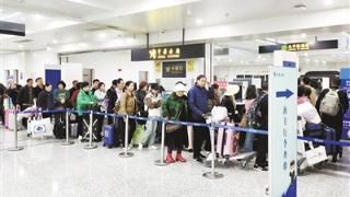 昌北机场迎来春运返程客流入境高峰
