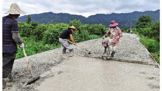 两江镇：筹措资金修建产业路