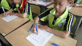 广平镇焦集小学三年级二班举办英语书写比赛