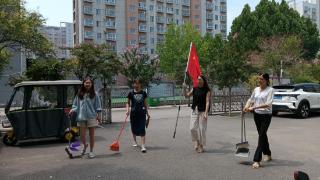 李营街道开展“党员志愿者进社区卫生清洁”志愿服务活动