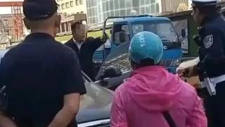 哈尔滨警方通报：指责并阻碍交警执法车主系某服装公司员工