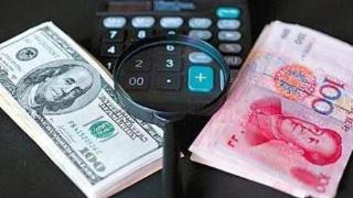 中国央行意外宣布降准25个基点，离岸人民币小幅走贬