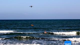 琼海海岸警察开展春节前防溺水“海陆空”救援演练