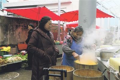 农贸市场换新颜“菜篮子”拎出“幸福味”